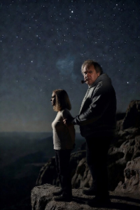 An attractive young woman and a menacing man standing on a ledge