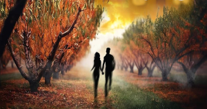 Lost male and female silhouette figures walking down a rural wooded path